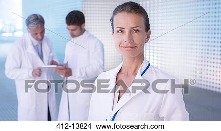 Picture - Portrait of confident doctor. Fotosearch