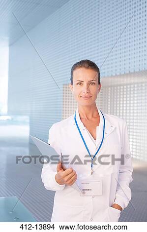 Portrait of confident doctor View Large Photo Image Picture - Portrait of confident doctor. Fotosearch