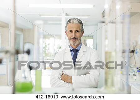 Portrait of confident scientist in laboratory View Large Photo Image Stock Image - Portrait of confident scientist in laboratory. Fotosearch