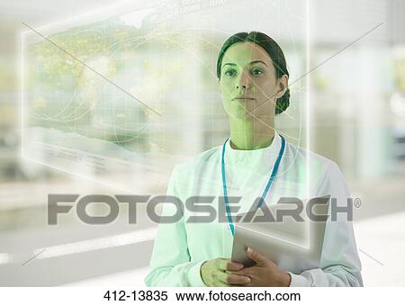 Portrait of serious doctor with clipboard in hospital View Large Photo Image Stock Photography - Portrait of serious doctor with clipboard in hospital. Fotosearch