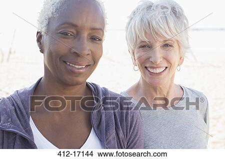 Portrait of smiling senior women View Large Photo Image Picture - Portrait of smiling senior women. Fotosearch