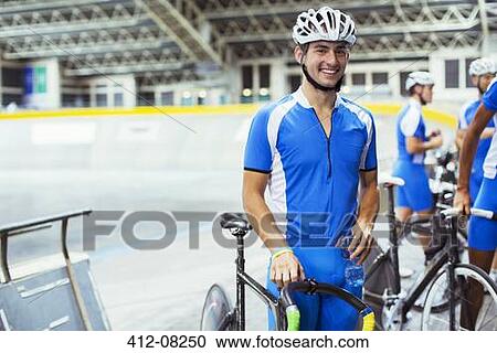 Stock Image - Portrait of track cyclist in velodrome. Fotosearch