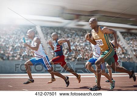Relay runners racing on track View Large Photo Image Stock Image - Relay runners racing on track. Fotosearch