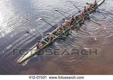 Rowing team in scull on lake View Large Photo Image Stock Image - Rowing team in scull on lake. Fotosearch