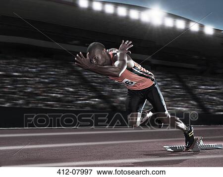 Runner racing on track View Large Photo Image Stock Photo - Runner racing on track. Fotosearch