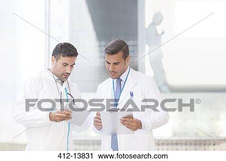 Scientists with digital tablet and clipboard View Large Photo Image Stock Image - Scientists with digital tablet and clipboard. Fotosearch