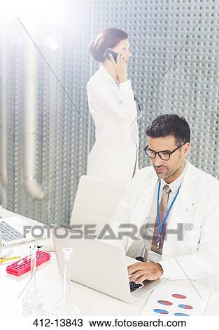Scientists working in laboratory View Large Photo Image Stock Image - Scientists working in laboratory. Fotosearch