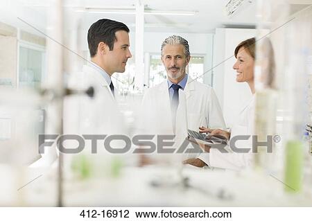 Scientists working in laboratory View Large Photo Image Stock Image - Scientists working in laboratory. Fotosearch