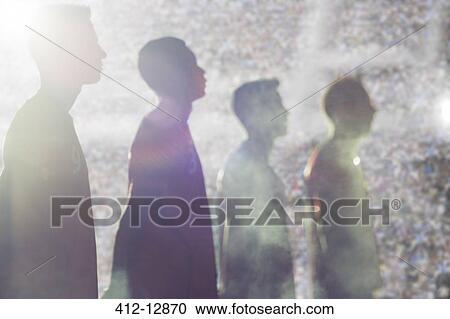 Silhouette of soccer players in stadium View Large Photo Image Stock Image - Silhouette of soccer players in stadium. Fotosearch