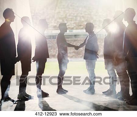 Silhouette of soccer teams shaking hands View Large Photo Image Stock Image - Silhouette of soccer teams shaking hands. Fotosearch