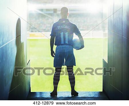 Soccer player walking onto field View Large Photo Image Stock Photo - Soccer player walking onto field. Fotosearch