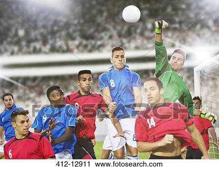 Soccer players jumping on field View Large Photo Image Stock Image - Soccer players jumping on field. Fotosearch
