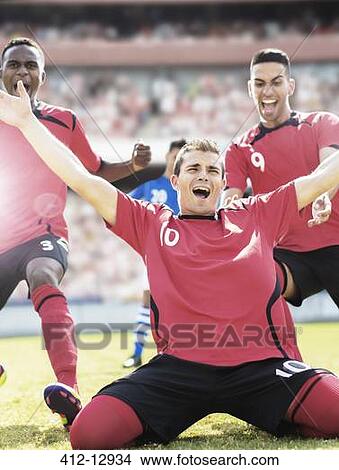 Soccer team celebrating on field View Large Photo Image Picture - Soccer team celebrating on field. Fotosearch