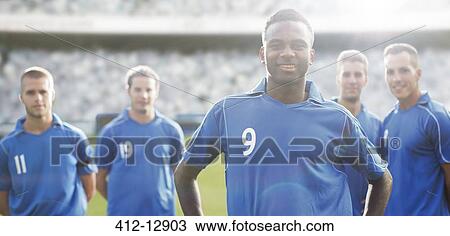 Soccer team smiling on field View Large Photo Image Stock Image - Soccer team smiling on field. Fotosearch
