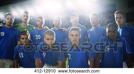 Soccer team standing in stadium View Large Photo Image Stock Image - Soccer team standing in stadium. Fotosearch