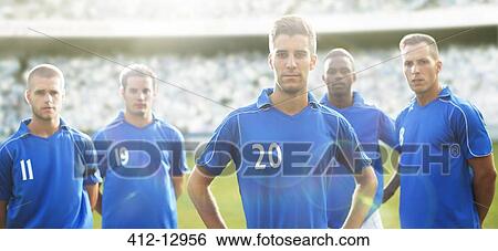 Soccer team standing on field View Large Photo Image Stock Photograph - Soccer team standing on field. Fotosearch