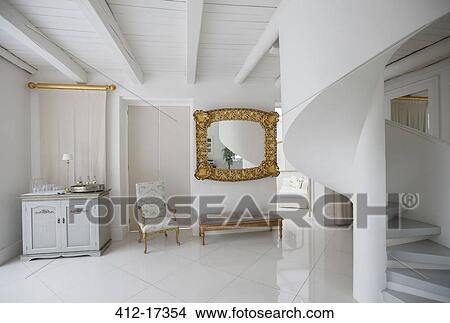 Spiral staircase in luxury foyer View Large Photo Image Picture - Spiral staircase in luxury foyer. Fotosearch