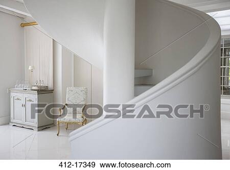 Spiral staircase in luxury foyer View Large Photo Image Stock Photo - Spiral staircase in luxury foyer. Fotosearch