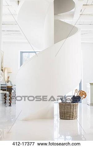 Spiral staircase in luxury foyer View Large Photo Image Stock Photo - Spiral staircase in luxury foyer. Fotosearch