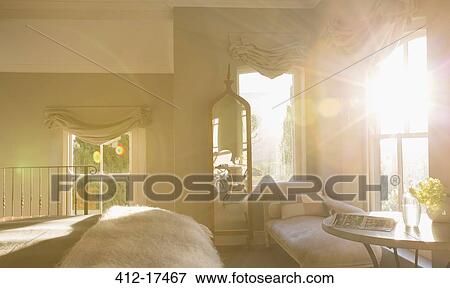 Sun shining in luxury bedroom View Large Photo Image Stock Photo - Sun shining in luxury bedroom. Fotosearch