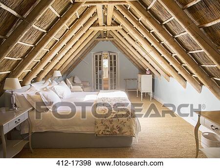 Sunny luxury attic bedroom View Large Photo Image Stock Photo - Sunny luxury attic bedroom. Fotosearch