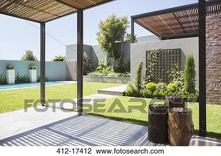 Sunny modern backyard View Large Photo Image Stock Image - Sunny modern backyard. Fotosearch
