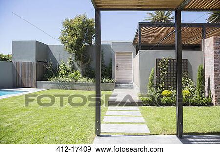 Sunny modern backyard View Large Photo Image Stock Photo - Sunny modern backyard. Fotosearch