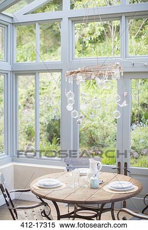 Stock Photography - Table in sunroom. Fotosearch