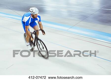 Track cyclist riding in velodrome View Large Photo Image Stock Image - Track cyclist riding in velodrome. Fotosearch