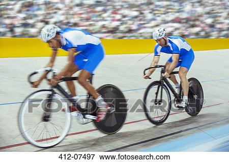 Track cyclists in velodrome View Large Photo Image Stock Photo - Track cyclists in velodrome. Fotosearch