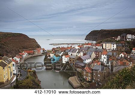 Stock Image - Village and bay, Staithes, Yorkshire, United Kingdom. Fotosearch