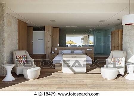 Bedroom open to sunny patio View Large Photo Image Stock Photo - Bedroom open to sunny patio. Fotosearch