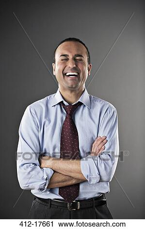 Businessman laughing View Large Photo Image Stock Image - Businessman laughing. Fotosearch