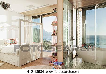 Child's bedroom with en suite bathroom View Large Photo Image Picture - Child's bedroom with en suite bathroom. Fotosearch