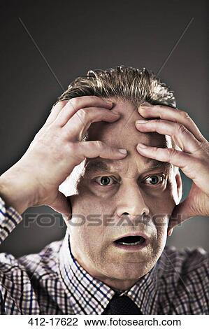 Close up of stressed businessman View Large Photo Image Stock Image - Close up of stressed businessman. Fotosearch