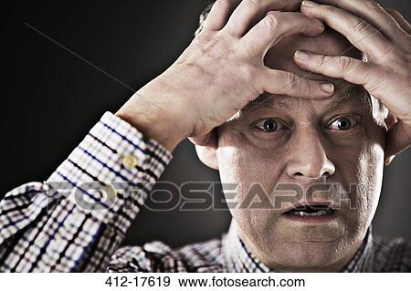 Close up of stressed businessman View Large Photo Image Stock Photo - Close up of stressed businessman. Fotosearch