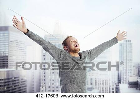 Exuberant man in urban window View Large Photo Image Stock Photo - Exuberant man in urban window. Fotosearch