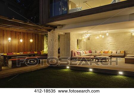 Illuminated patios with benches at night View Large Photo Image Stock Photography - Illuminated patios with benches at night. Fotosearch