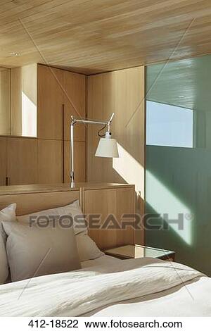 Lamp over bed View Large Photo Image Stock Image - Lamp over bed. Fotosearch