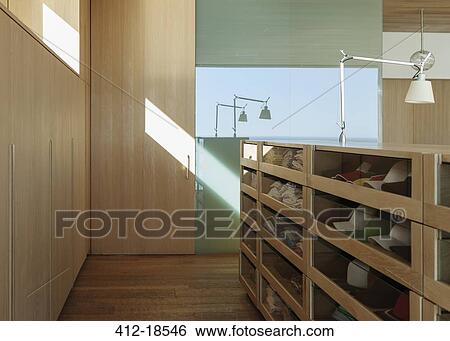 Luxury walk-in closet with drawers View Large Photo Image Stock Photograph - Luxury walk-in closet with drawers. Fotosearch