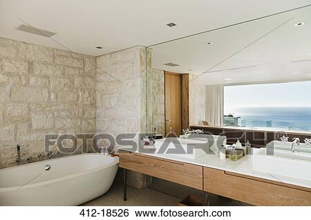 Modern bathroom with ocean view View Large Photo Image Stock Photograph - Modern bathroom with ocean view. Fotosearch
