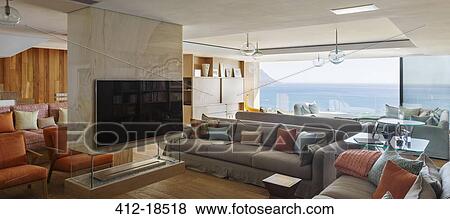 Stock Photo - Modern living room with ocean view. Fotosearch