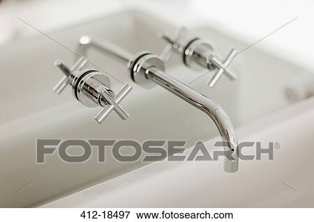 Modern sink faucet View Large Photo Image Stock Photo - Modern sink faucet. Fotosearch