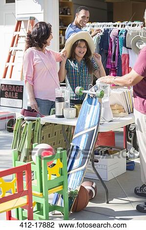 People shopping at garage sale View Large Photo Image Stock Image - People shopping at garage sale. Fotosearch