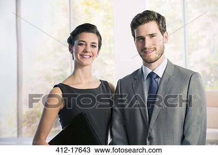 Stock Image - Portrait of confident business people. Fotosearch