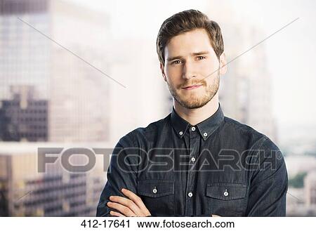 Portrait of confident businessman in urban window View Large Photo Image Stock Image - Portrait of confident businessman in urban window. Fotosearch