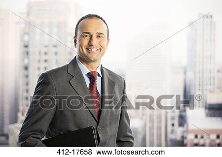 Portrait of confident businessman in urban window View Large Photo Image Stock Photo - Portrait of confident businessman in urban window. Fotosearch