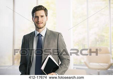 Portrait of confident businessman View Large Photo Image Picture - Portrait of confident businessman. Fotosearch