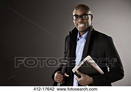Portrait of confident businessman View Large Photo Image Stock Image - Portrait of confident businessman. Fotosearch
