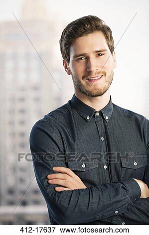 Stock Photo - Portrait of confident businessman. Fotosearch